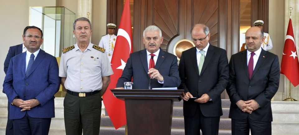 Turkish PM Binali Yildirim addresses the nation along with other top Turkish officials in Ankara on Saturday July, 16 2016. Image: Reuters