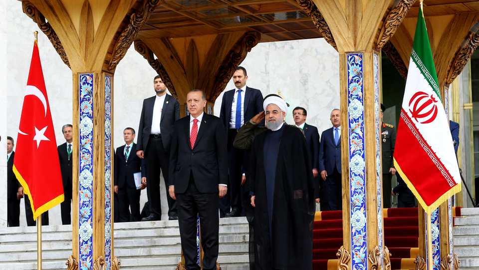 Turkish President Tayyip Erdogan is seen with Iranian President Hassan Rouhani during a welcoming ceremony in Tehran, Iran, October 4, 2017.