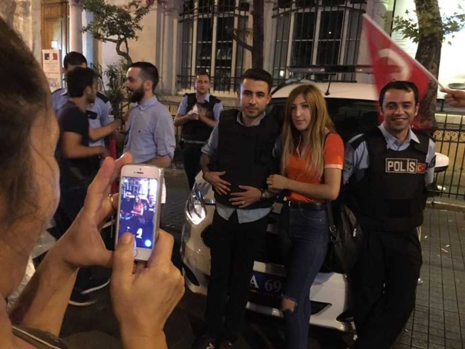 Crowds take selfies with police who were part of efforts to rout soldiers attempting to overthrow the government. July 16, 2016.