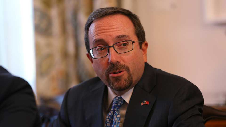 US Ambassador John Bass attends a news conference in Ankara, Turkey, Wednesday, Oct. 11, 2017. Speaking during a news conference in Belgrade, Serbia on Tuesday, Turkey's President Recep Tayyip Erdogan accused Bass of wrecking ties between the NATO allies by suspending the issuing of visas to Turkish citizens at US diplomatic missions following the arrest of a Turkish employee at the consulate in Istanbul.