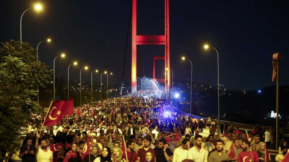 Pro-government demonstrators march over the Bosphorus Bridge, from the Asian to the European side of Istanbul, Turkey, July 21, 2016
