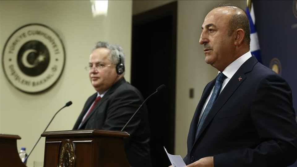 Turkish Foreign Minister Mevlut Cavusoglu (R) and Greek Foreign Minister, Nikos Kotzias (L) hold a joint press conference after their meeting in Ankara, Turkey on October 24, 2017. AA