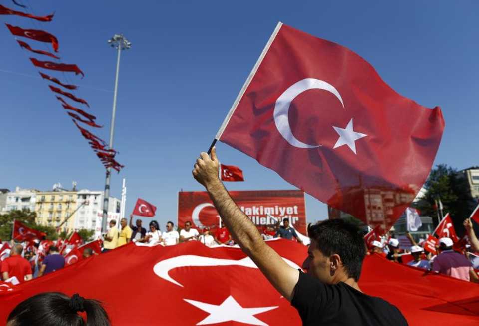 Supporters of various political parties gather in Istanbul's Taksim Square and wave Turkey's national flags during the Republic and Democracy Rally organised by main opposition Republican People's Party (CHP), Turkey, July 24, 2016.