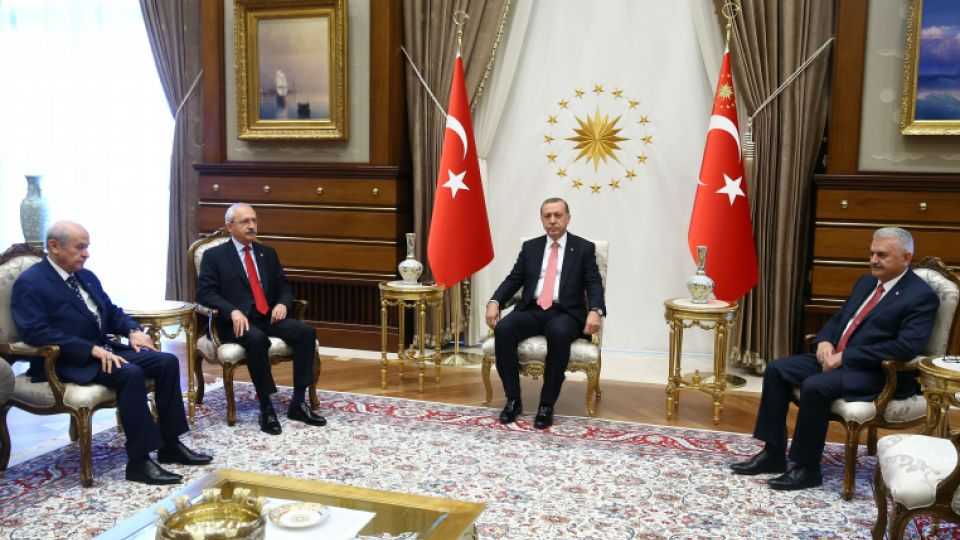 President Recep Tayyip Erdogan (2nd R) meets with the leader of Turkey's governing AK Party Binali Yildirim (R), the leader of CHP Party Kemal Kilicdaroglu (2nd L) and the leader of the MHP Devlet Bahceli (R) at Presidential Complex in Ankara