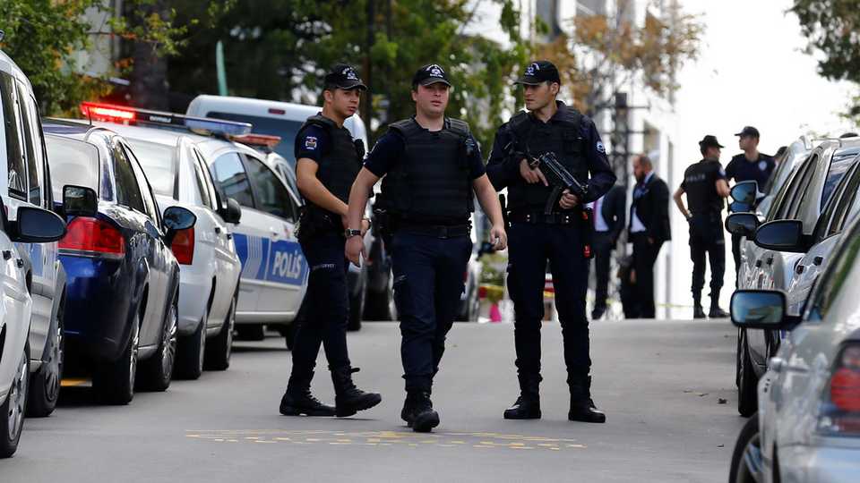 File photo shows policemen standing guard in Ankara.