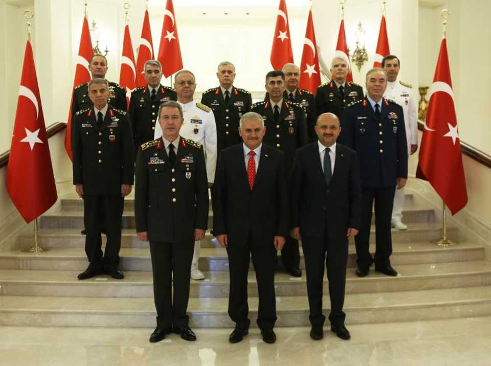 Turkish Prime Minister Binali Yildirim (C) and members of Turkish Supreme Military Council (YAS) pose for a photo during Turkish Supreme Military Council meeting at Cankaya Palace in Ankara, Turkey on July 28, 2016.