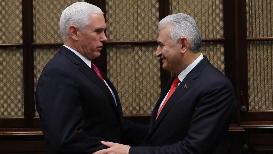 Turkish Prime Minister Binali Yildirim (R) meets US Vice President Mike Pence (L) at the Roosevelt Room in the White House in Washington, United States. November 09, 2017.