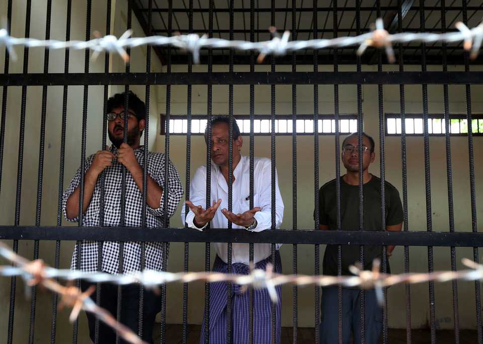 TRT World crew, Aung Naing Soe, Hla Tin, and Lau Hon Meng stand for their first court appearance after found possessing a drone on Friday, Nov. 10, 2017, in Myanmar’s capital Naypyidaw.