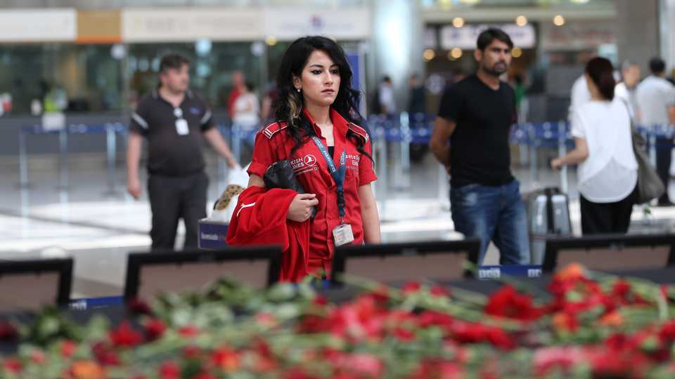 Passengers are seen at the Ataturk International Airport after the air traffic and working process returned to normal following terror attack in Istanbul, Turkey on July 1, 2016.