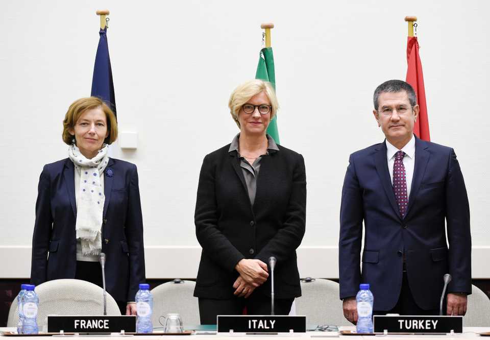 (From L) French Defence Minister Florence Parly, Italian Defence Minister Roberta Pinotti and Turkish Defence Minister Nurettin Canikli meet to sign a letter of intent as part of a project for Turkey to purchase air defence systems and surface-to-air missiles manufactured by the Franco-Italian consortium Eurosam, at the NATO headquarters in Brussels on November 8, 2017, on the sidelines of a NATO meeting.
