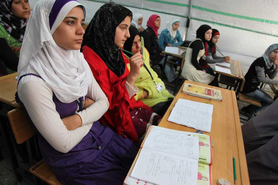Syrian refugee children receiving education in Turkey (source: AFAD website)