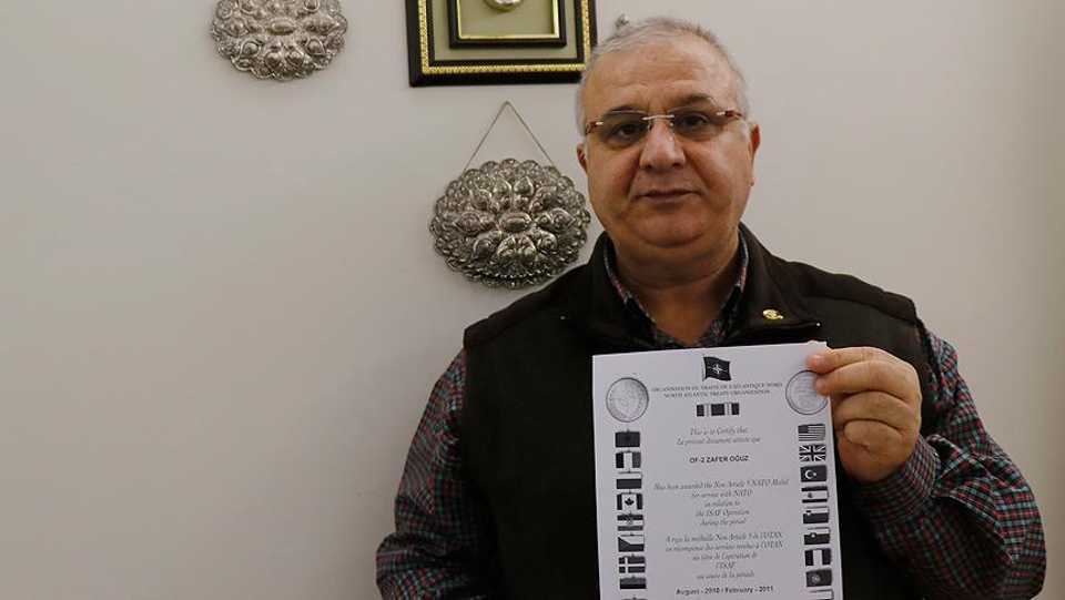 Zafer Oguz, a Turkish military major, has returned his NATO certificate and medal after the recent NATO drill incident.