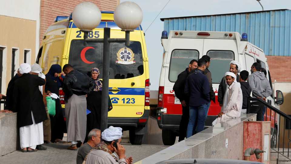 Relatives of victims of the attack on the Al Rawdah mosque and ambulances outside Suez Canal University hospital in Ismailia, Egypt, November 25, 2017.