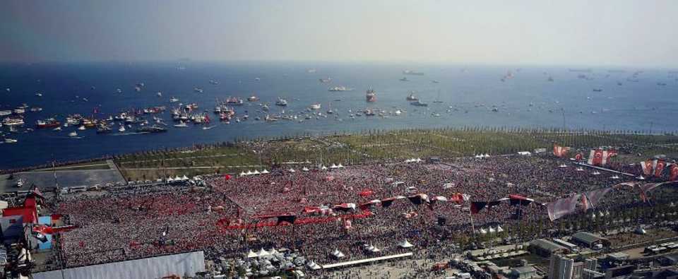 This handout picture released by the Turkey's Presidential Press Service and taken on August 7, 2016 shows people waving Turkish national flags as they gather at Yenikapi in Istanbul during a rally against failed military coup on July 15.