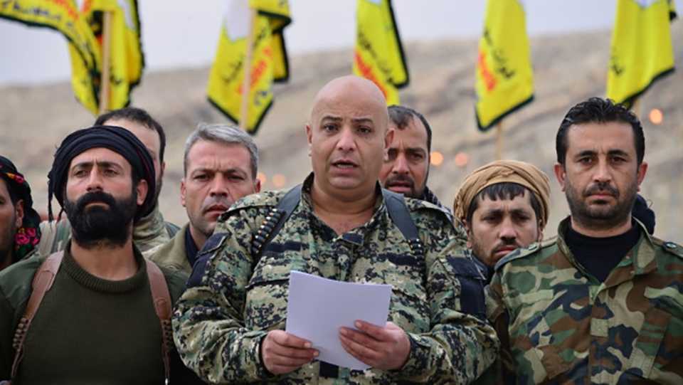 Former SDF spokesman Talal Silo (Centre) in a file image of when he served as spokesperson of the SDF.