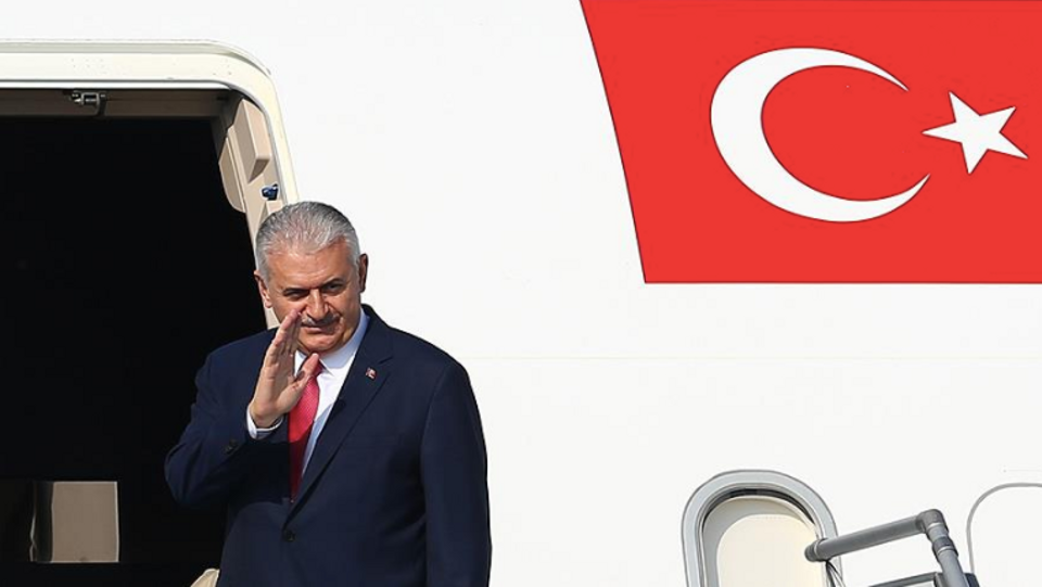 November 07, 2017 file photo shows Prime Minister of Turkey Binali Yildirim waves during his departure from Esenboga International Airport to the United States after a press conference in Ankara, Turkey.