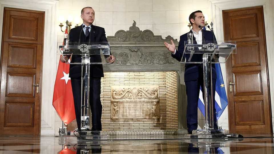 Greek Prime Minister Alexis Tsipras and Turkish President Tayyip Erdogan attend a press conference following their meeting at the Maximos Mansion in Athens. December 7, 2017.