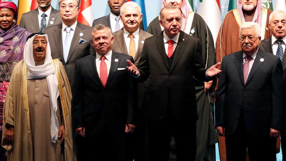 Turkey's President Recep Tayyip Erdogan (2nd R) poses with Emir of Kuwait Sabah Al-Ahmad Al-Jaber Al-Sabah (L), Jordan's King Abdullah (2nd L) and Palestinian President Mahmoud Abbas (R) at the Organisation of Islamic Cooperation (OIC) summit in Istanbul, Turkey, December 13, 2017.