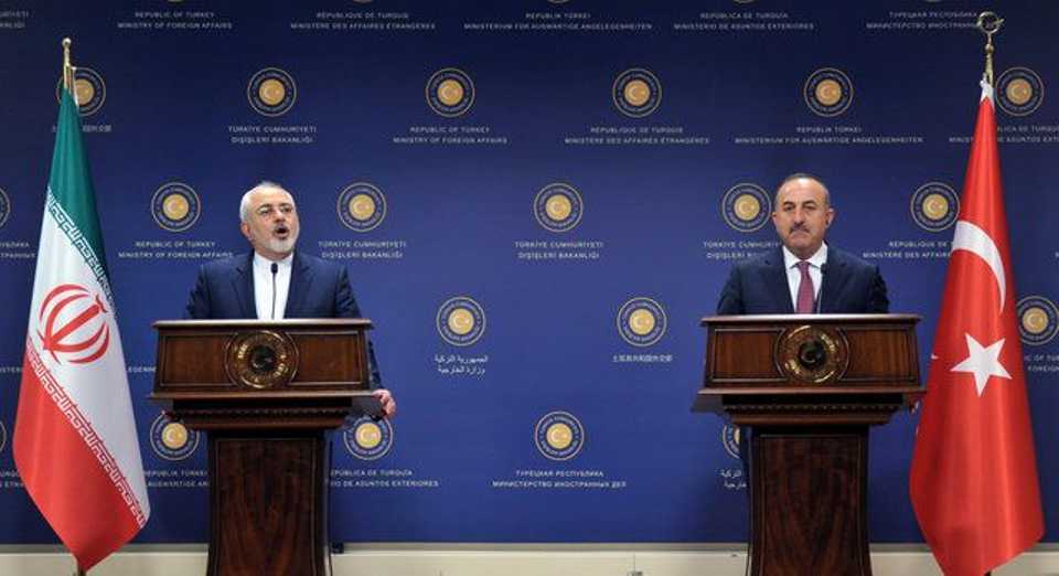 Turkish Foreign Minister Mevlüt Çavuşoğlu (R) AT a press conference along with his Iranian counterpart Javad Zarif in Ankara, Turkey, August 12, 2016.