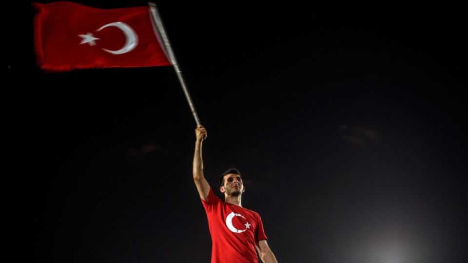 A man waves a Turkish national flag in Istanbul during a rally against a failed military coup on July 15.