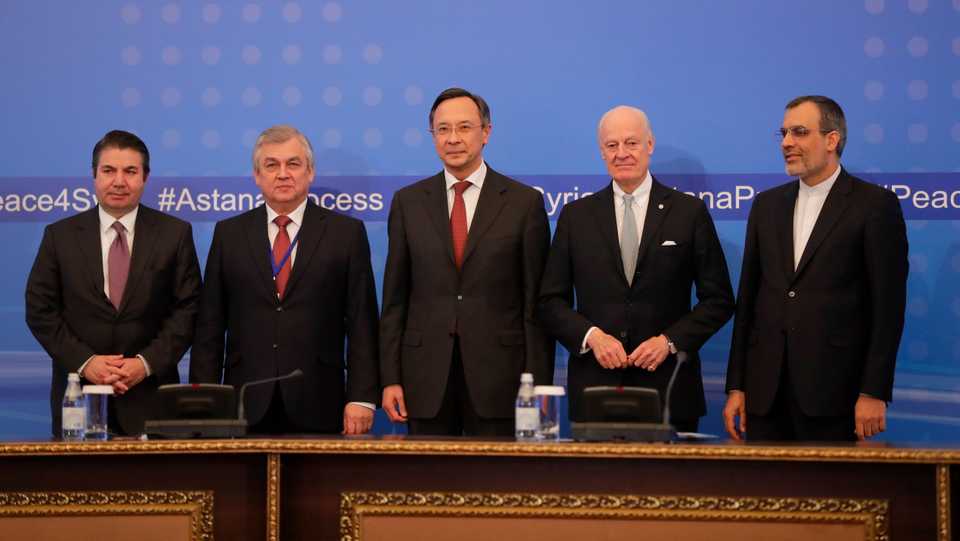 This January 24, 2017 file photo shows officials attending Astana Talks posing for a photo in Astana, Kazakhstan.