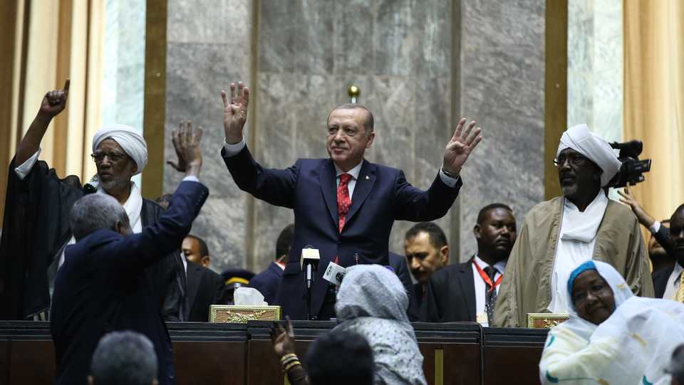 President of Turkey Recep Tayyip Erdogan greets members of parliament at the National Assembly of Sudan in Khartoum, Sudan on December 24, 2017.