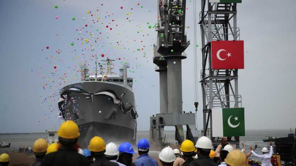 Turkish and Pakistani flags are displayed together during the launching ceremony of a fleet tanker in Karachi, Pakistani. The tanker is a collaborative work by Pakistan Ministry of Defence and Turkish Defence Industries.