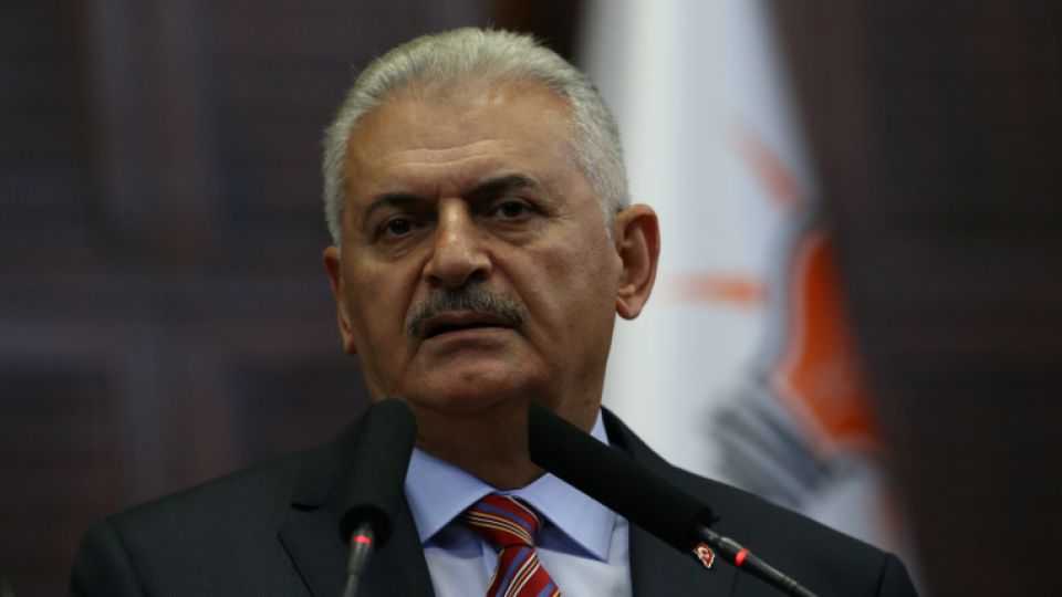 Turkey's Prime Minister Binali Yildirim addresses members of parliament from his ruling AK Party (AKP) during a meeting at the Turkish parliament in Ankara, Turkey, August 2, 2016. 