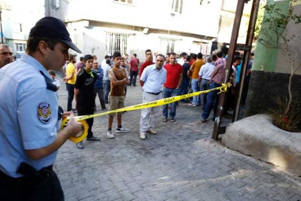 A police officer secures the scene of an explosion where a suspected suicide bomber targeted a wedding celebration in the Turkish city of Gaziantep, Turkey on August 21, 2016. 