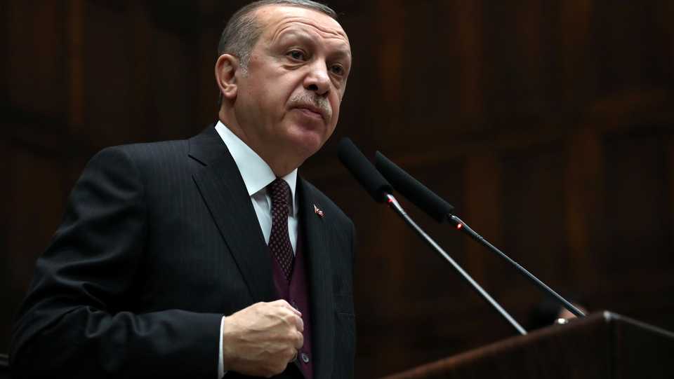 Turkish President Recep Tayyip Erdogan addresses members of parliament from his governing AK Party during a meeting at the Turkish parliament in Ankara, Turkey, January 9, 2018.