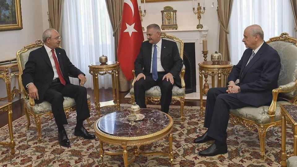 Republican's People Party (CHP) leader Kemal Kılıçdaroğlu [left], Prime Minister Binali Yıldırım [centre] and the Nationalist Movement Party (MHP) leader Devlet Bahçeli [right].