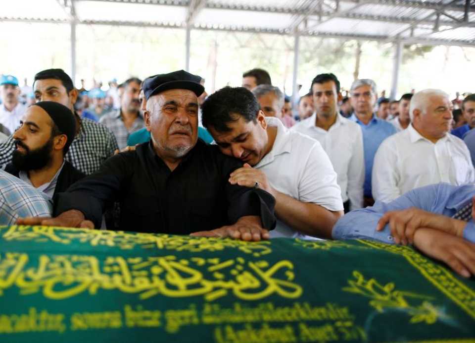 Relatives of Kumri Ilter, one of the victims of Saturday's suicide bombing at a wedding, mourn during her funeral ceremony in southeastern city of Gaziantep, Turkey, on August 22, 2016.
