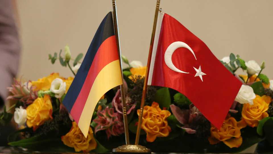 This February 2, 2017 file photo shows the German and the Turkish flag sitting on a table during a press statement of Turkish President Recep Tayyip Erdogan and German Chancellor Angela Merkel after a meeting in Ankara, Turkey.