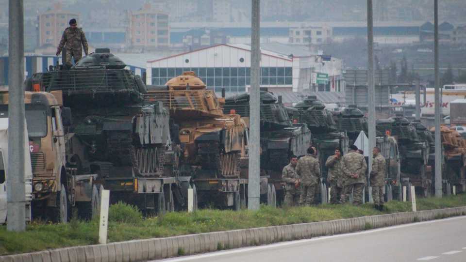 Turkish Army's military trucks carry armoured vehicles to reinforce the border units in Hatay, Turkey on January 17, 2018.