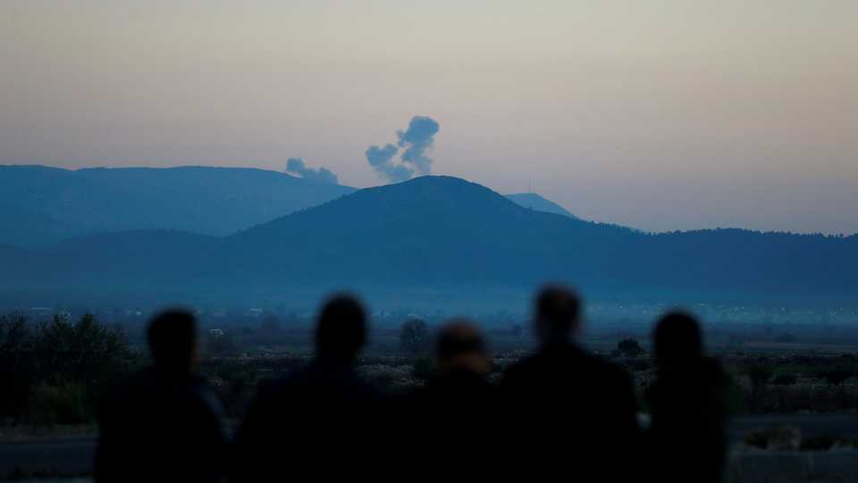 Smoke rises from the Syria's Afrin region, as it is pictured from near the Turkish town of Hassa, on the Turkish-Syrian border in Hatay province, Turkey January 20, 2018.