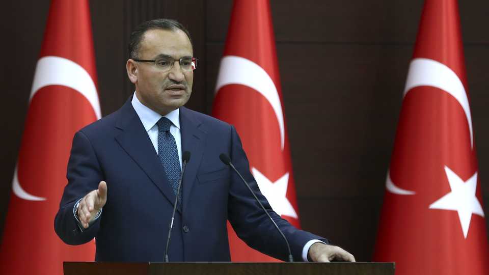 In this January 22, 2018 file photo Turkish Deputy Prime Minister and government spokesperson Bekir Bozdag gives a speech during a press conference after the cabinet meeting in Ankara, Turkey.