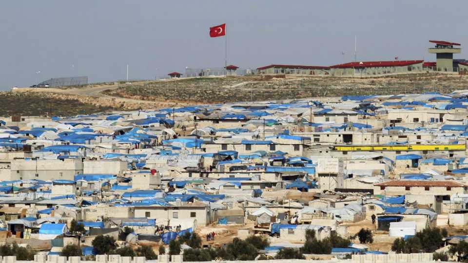 A general view shows tents housing internally displaced people in Atma camp, near the Syrian-Turkish border in Idlib where this recent attack took plce.