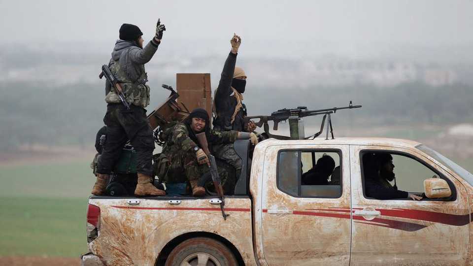 Al Qaeda-linked Jabhat al Nusra militants are pictured in a 2014 file photo. Militants, who occupied top leadership positions in Daesh and Nusra Front, were among the prisoners released by the Assad regime.