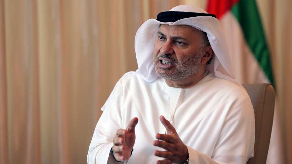 In the file photo, Anwar Gargash, UAE Minister of State for Foreign Affairs talks to The Associated Press about relations with Qatar.