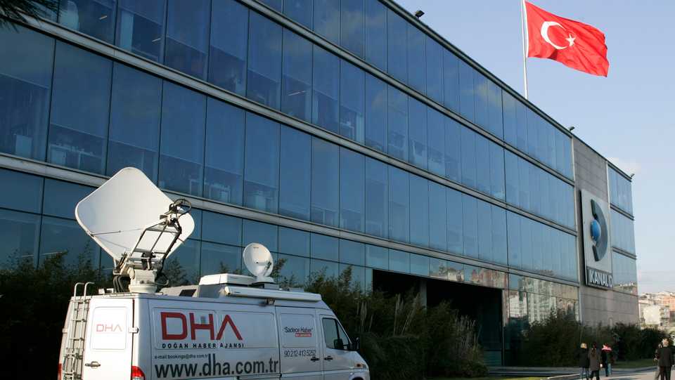 In this February 20, 2009 file photo, a TV transmission vehicle is parked outside of the Dogan group TV headquarters in Istanbul, Turkey.