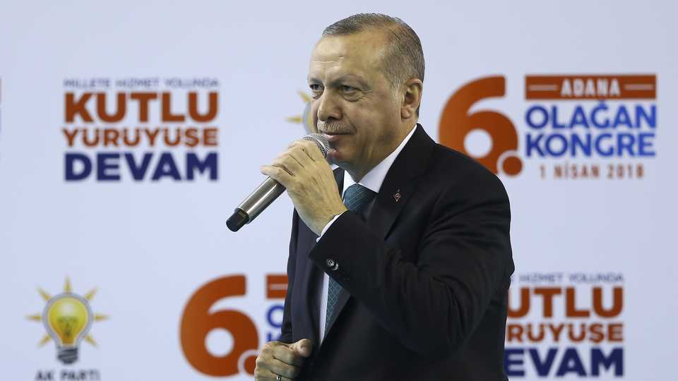 President of Turkey and leader of Turkey's ruling Justice and Development Party (AK Party) Recep Tayyip Erdogan addresses the crowd during the AK Party's 6th ordinary provincial congress in Adana province of Turkey on April 1, 2018.