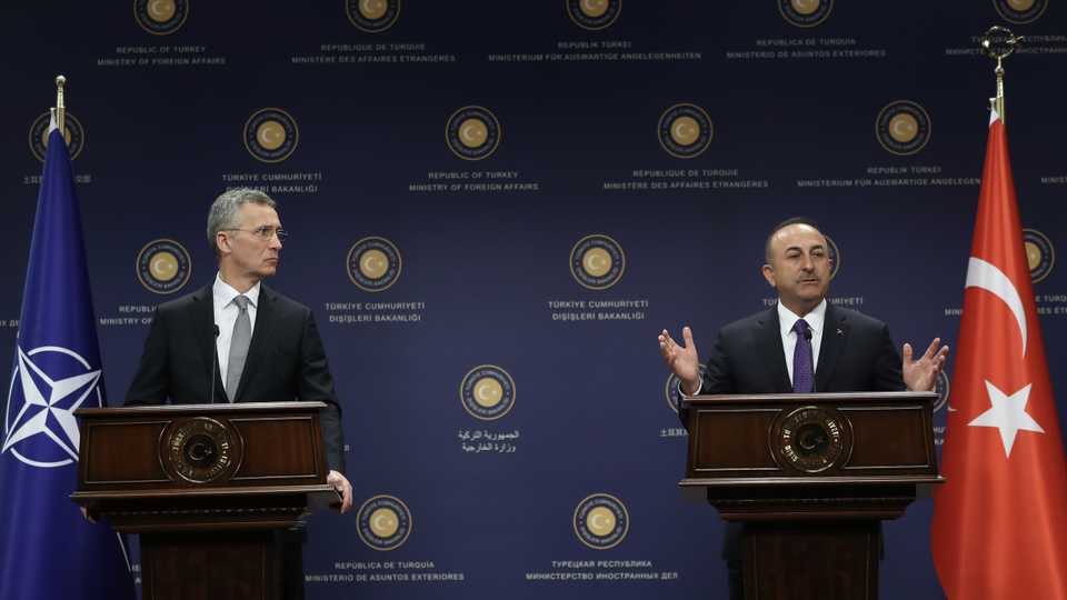 Turkish Foreign Minister Mevlut Cavusoglu (R) makes a speech during a joint press conference with North Atlantic Treaty Organization (NATO) Secretary General Jens Stoltenberg (L) following their meeting at the Turkish Foreign Ministry Building in Ankara, Turkey on April 16, 2018.
