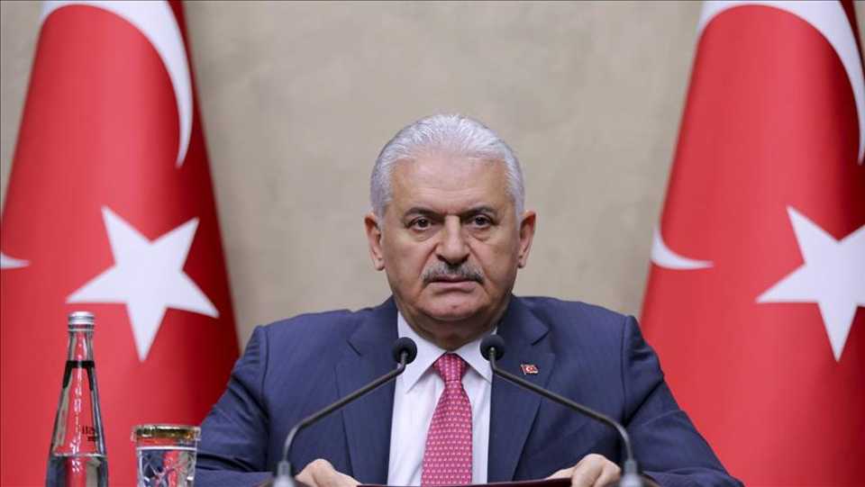 Turkish Prime Minister Binali Yildirim delivers a speech as he holds a press conference at the Ankara Esenboga Airport ahead of his departure to Spanish capital Madrid for an official visit in Ankara, Turkey on April 24, 2018.