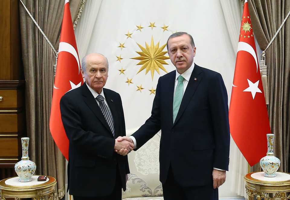 In this November 3, 2016 file photo, Turkish President Recep Tayyip Erdogan (R) meets Turkey's Nationalist Movement Party's leader (MHP) Devlet Bahceli (L) at the Presidential Mansion in Ankara, Turkey.