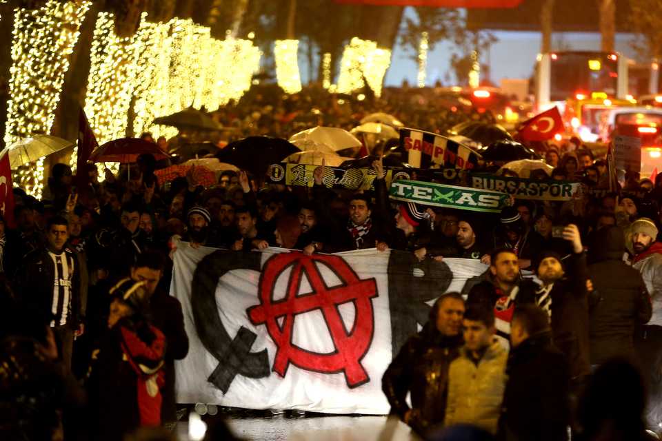 Turkish soccer fans march to Besiktas Vodafone Arena, where twin terrorist attacks occurred, to commemorate the attacks' victims in Istanbul, Turkey on December 12, 2016.