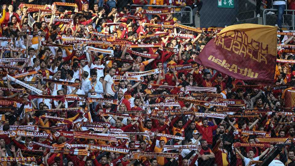 Fans celebrate at Galatasaray's win over Yeni Malatyaspor. A draw is all that is needed for them to win the title for the 21st time.