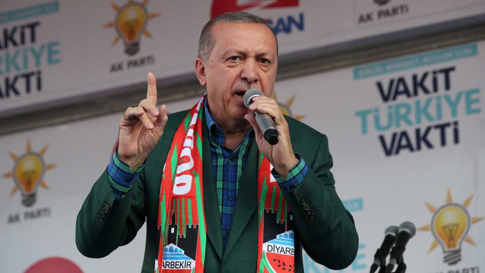 Turkish President Tayyip Erdogan addresses his supporters during an election rally in Diyarbakir.