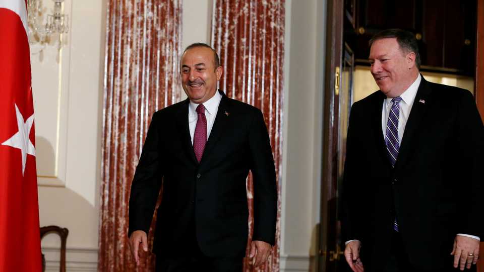 Turkish Foreign Minister Mevlut Cavusoglu (L) and US Secretary of State Mike Pompeo at the State Department in Washington, US, on June 4, 2018.