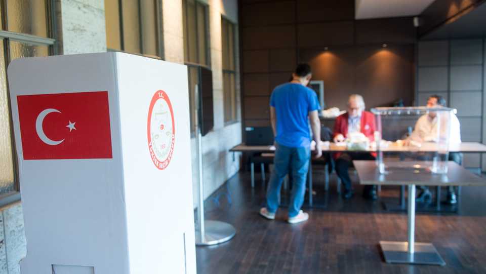 This July 31, 2014 file photo shows election assistants prepare a polling station for the Turkish presidential elections at the Olympic Stadium in Berlin.