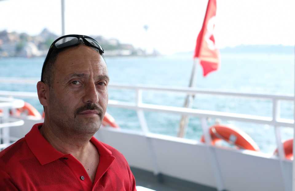 Orhan Kucukerman, a MHP supporter says the People’s Alliance’ victory wouldn’t bring many changes - it would rather prevent the huge potential changes if Nation’s Alliance wins. Karakoy - Uskudar ferry, Istanbul, June 7, 2018.